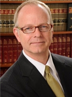 Mr. Brian L. Champion