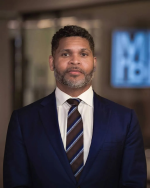 Mr. Derrick A. Mills