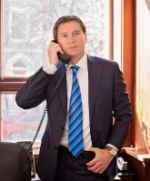 James E. Hacker, Esq.