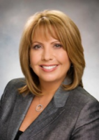 Ms. Joan DeMichael Henry