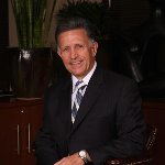 Mr. L Craig Metcalf