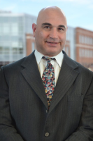 Mr. Scott Victor Kamins
