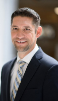 Mr. Travis B. Alkire