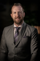 Mr. Travis I. Krepelka, CFLS